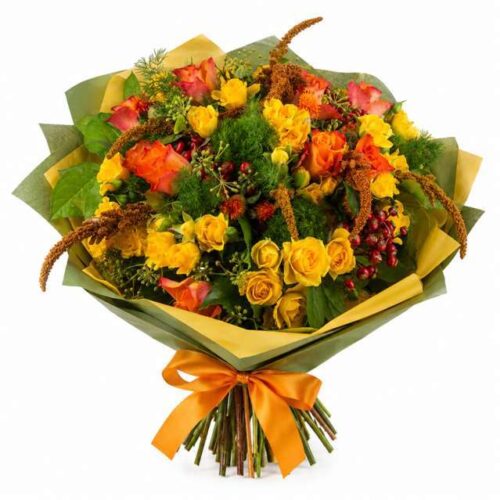 Bouquet di fiori misti dai toni caldi